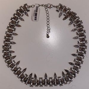 Choker necklace.